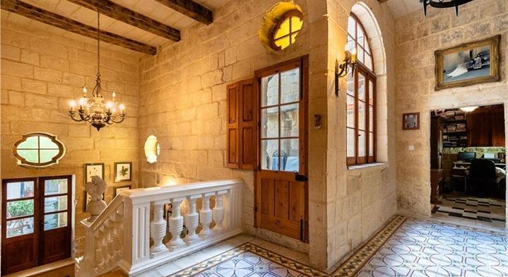 An imposing grand double fronted townhouse situated