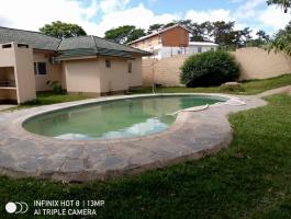 Four bedrooms stand alone house together with a coltage for rent