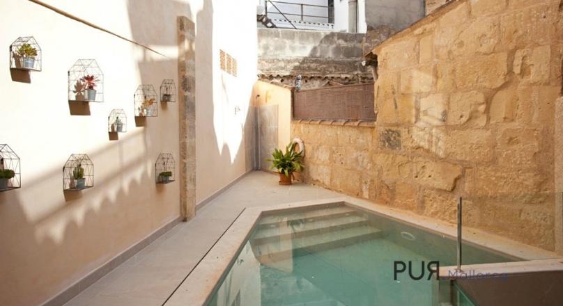 Pollenca. The most beautiful city in the north. Many say. A mansion there. In the middle. The finest