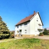 Detached one to two family house with 1592 m² sunny plot, 2 garages, quiet location