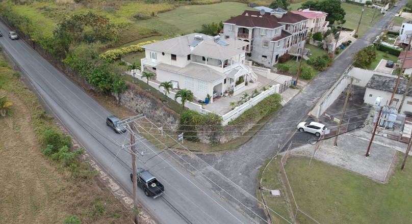 6 Bedroom 4 Bath property with 2 apartments attached located in St. George, Barbados is for sale.