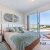 New villas. Very chic. Very high quality. And on foot at the port and on the beach.