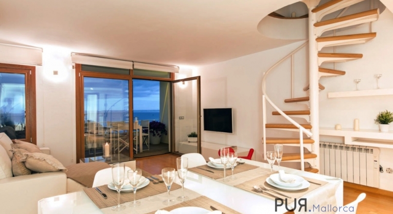 Cas Catala. Duplex penthouse. With a view of the bay of Cala Mayor and San Agusti