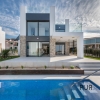 New villas. Very chic. Very high quality. And on foot at the port and on the beach.