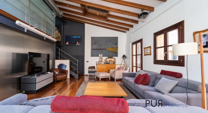 Palma. A loft. Right in the middle of the old town. Really stylish. 