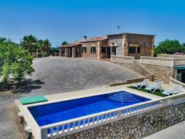 Sant Llorenc. Natural stone finca with pool. And with a view of the sea.