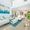 New villas. Very chic. Very high quality. And on foot at the port and on the beach.