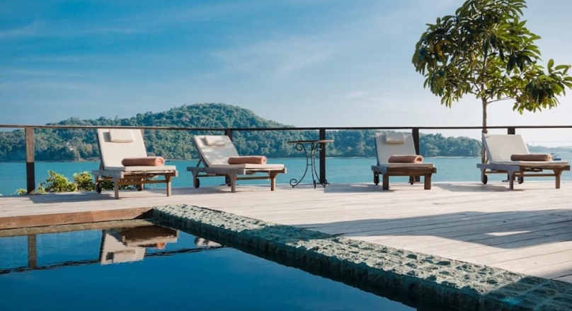 Phuket quality real estate presents this beautiful waterfront villa