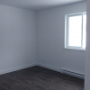 Grand logement style condo