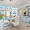 New villas. Very chic. Very high quality. And on foot at the port and on the beach.