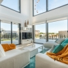 New villas. Very chic. Very high quality. And on foot at the port and on the beach.