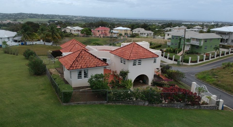 Breezy and spacious 3 Bed 2 Bath House with a roof deck located in St. George, Barbados is for sale.