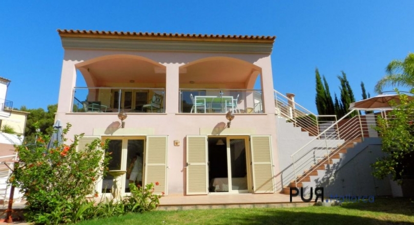 Well maintained villa. And from the roof terrace a view of the sea off the coast of Canyamel.